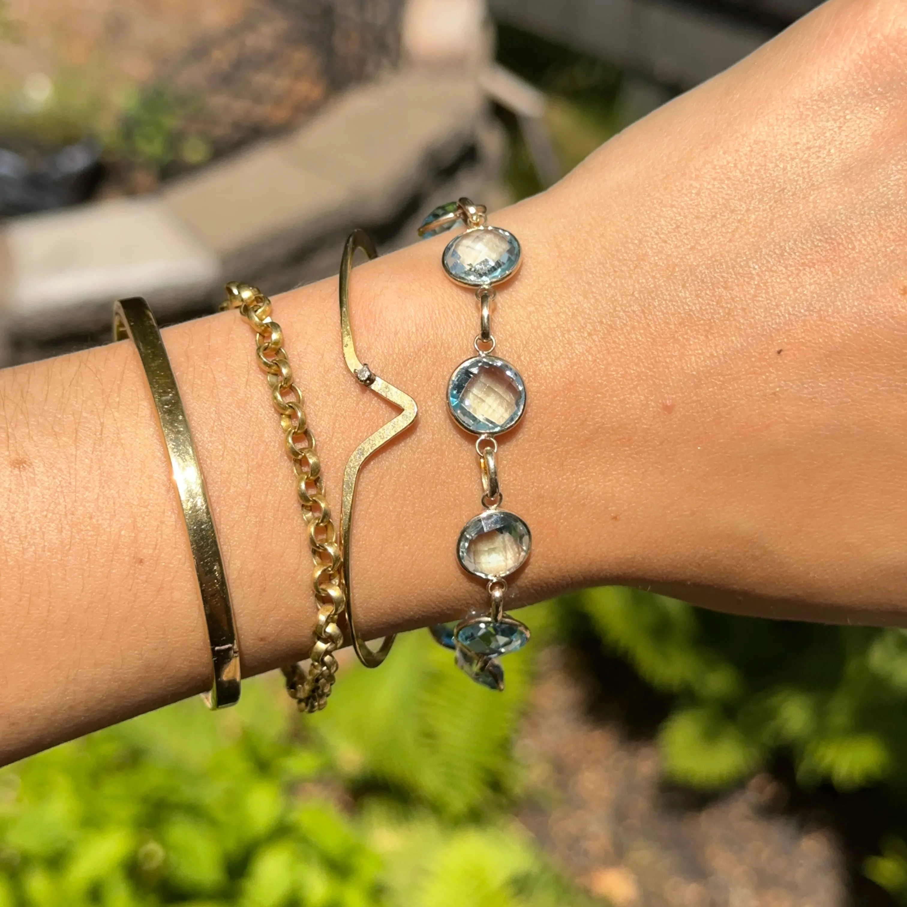 14KT Yellow Gold Checkerboard Faceted Blue Topaz Bezel Set Bracelet