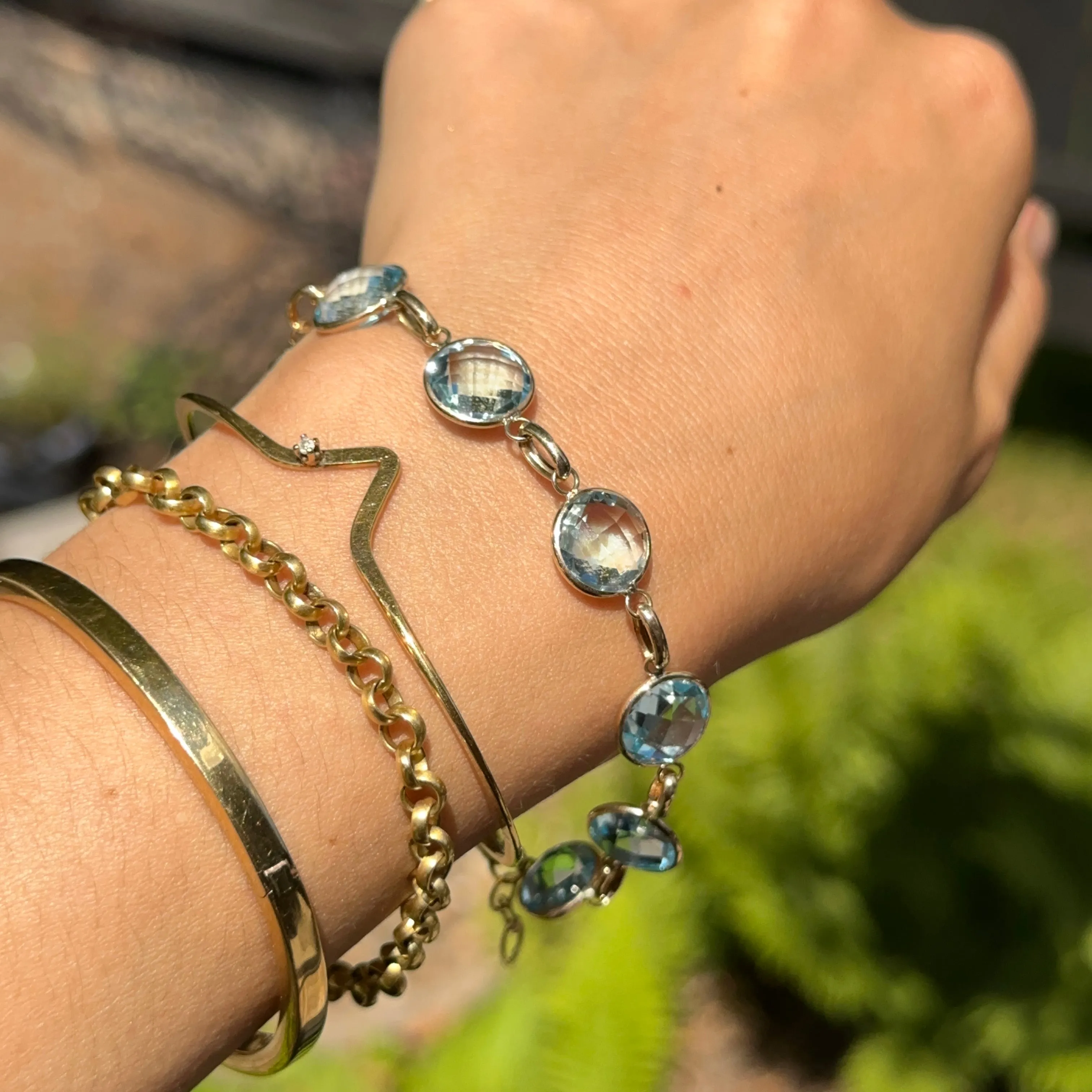 14KT Yellow Gold Checkerboard Faceted Blue Topaz Bezel Set Bracelet