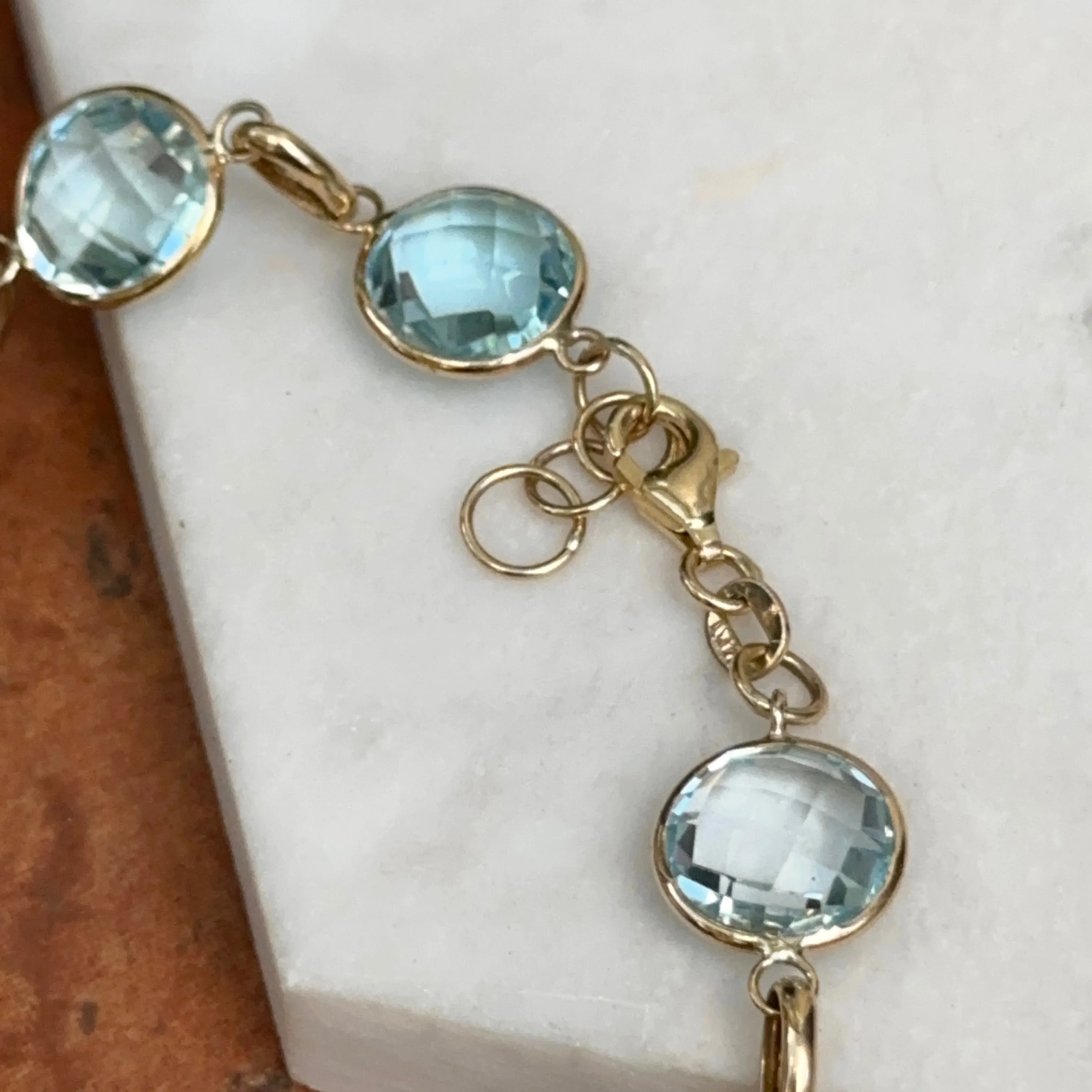 14KT Yellow Gold Checkerboard Faceted Blue Topaz Bezel Set Bracelet