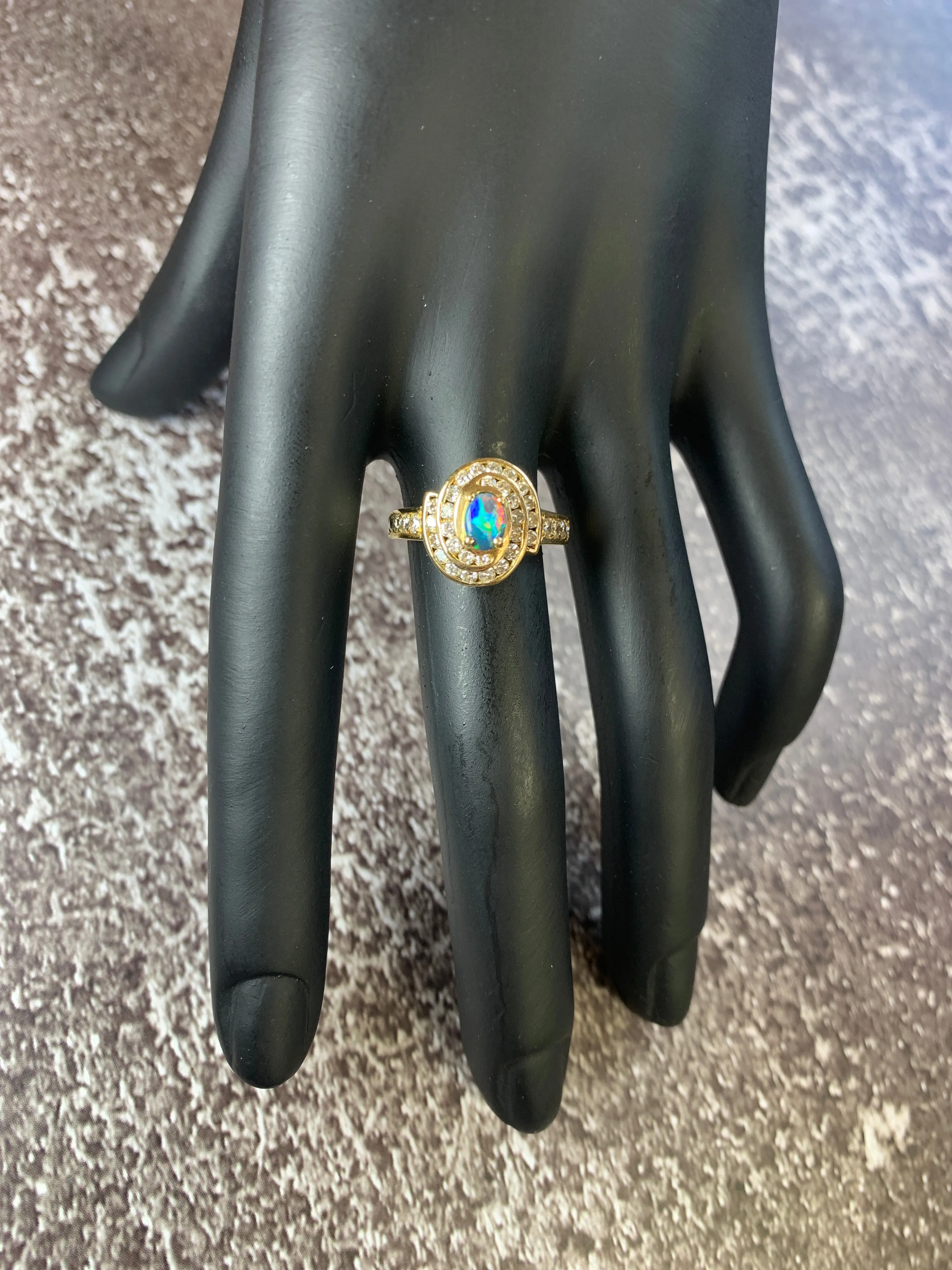 18kt Yellow Gold cluster Black Opal 0.3 Diamonds 0.44 ring