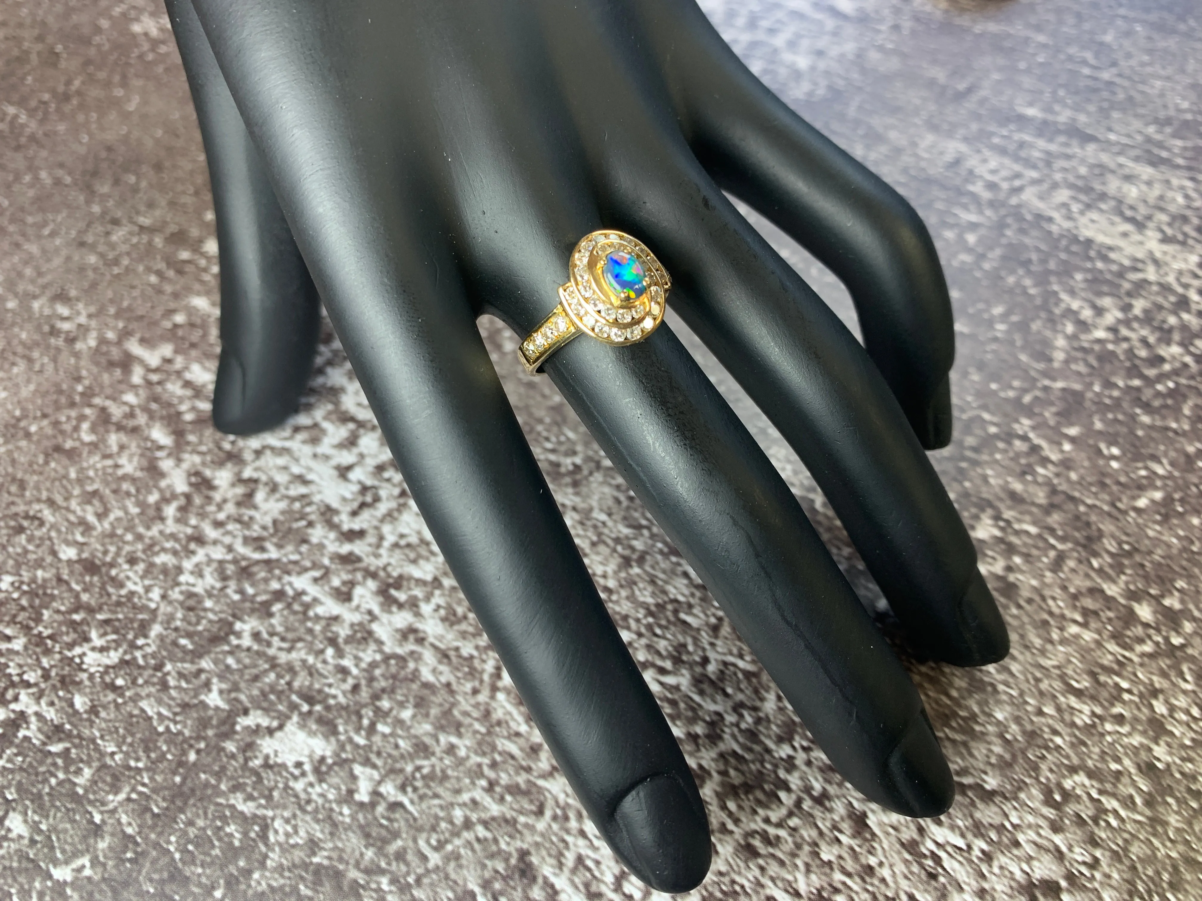 18kt Yellow Gold cluster Black Opal 0.3 Diamonds 0.44 ring