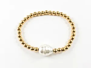 Nice Yellow Gold Bead With Single Baroque Pearl Stretch Steel Bracelet