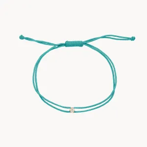 the nova diamond teal cord bracelet - yellow gold, diamond, teal nylon